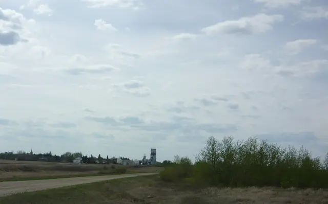 St. Gregor seen from a distance across the prairie